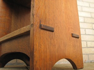 In closeup, it's easy to see the pin in the front face that holds the through tenon in place.